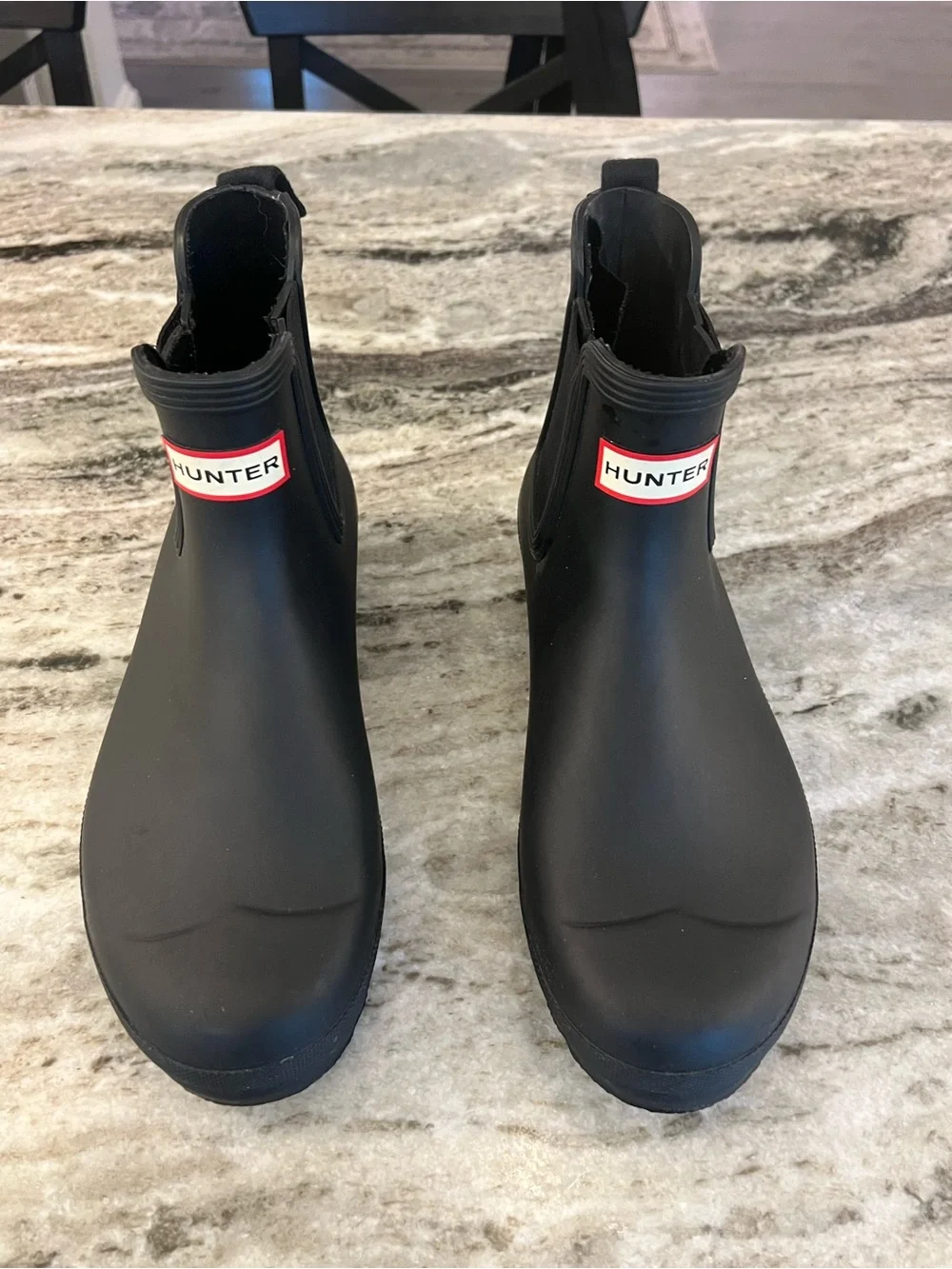 Hunter women’s Black Chelsea Rain Boots with Red Logo